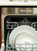 The dishwasher stops and starts during the wash cycle